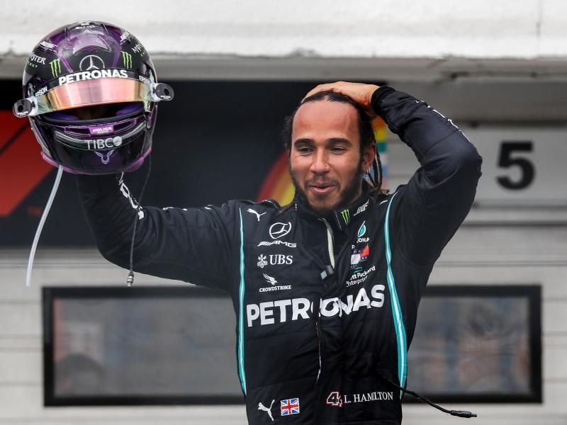 Nahm mit Christina Aguilera einen Song auf: Formel-1-Weltmeister Lewis Hamilton. Foto: Leonhard Foeger/Pool Reuters/dpa
