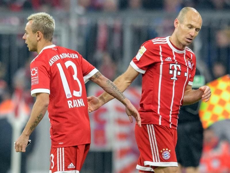 Arjen Robben (r) und Rafinha bleiben dem Rekordmeister erhalten. Foto: Matthias Balk