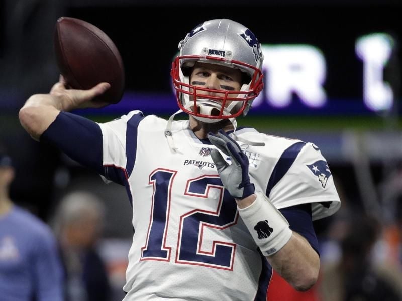 Laut Medienberichten setzt Quarterback Tom Brady seine Karriere bei seinem Club New England Patriots fort. Foto: Patrick Semansky/AP