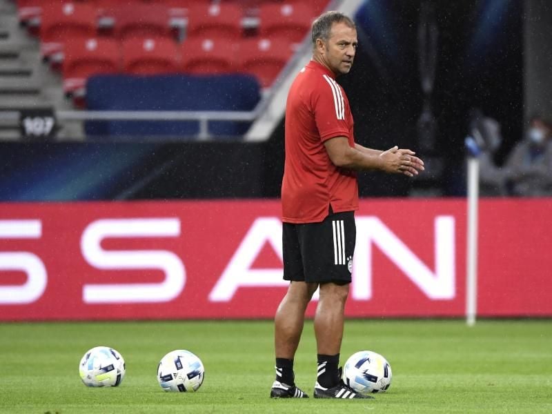 Bayern-Trainer Hansi Flick muss mit seinem Team bei der TSG 1899 Hoffenheim antreten. Foto: Attila Kisbenedek/Pool AFP/AP/dpa