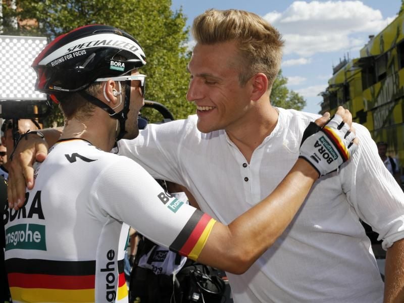 Ex-Sprintstar und aktueller Meister vereint: Marcel Kittel (r) und Maximilian Schachmann. Foto: Yuzuru Sunada/BELGA/dpa