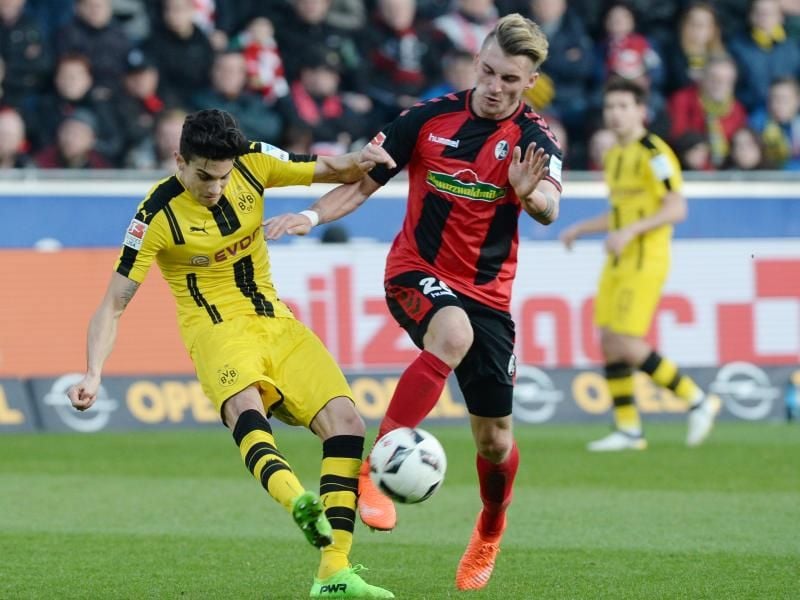 Der Dortmunder Marc Bartra (l) und Maximilian Philipp sind wohl bald Teamkollegen. Foto: Patrick Seeger