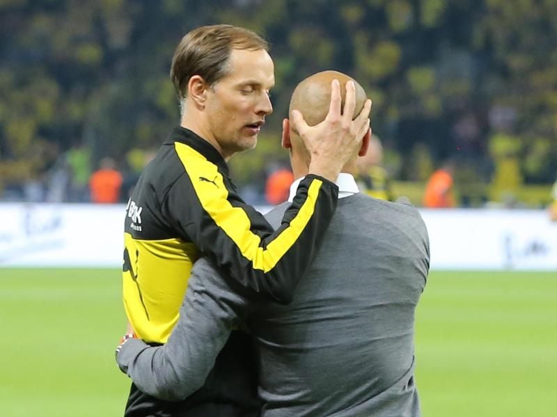 Münchens ehemaliger Trainer Josep Guardiola (r) soll sich Thomas Tuchel als Nachfolger gewünscht haben. Foto: Kay Nietfeld
