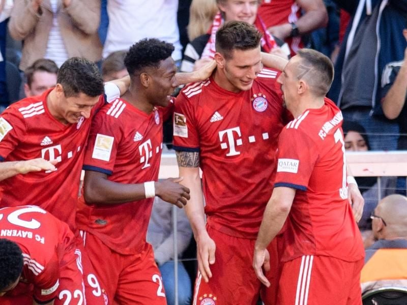 Der FC Bayern München legte im Meisterschaftsrennen dank des Treffers von Niklas Süle (2.v.r.) vor. Foto: Matthias Balk
