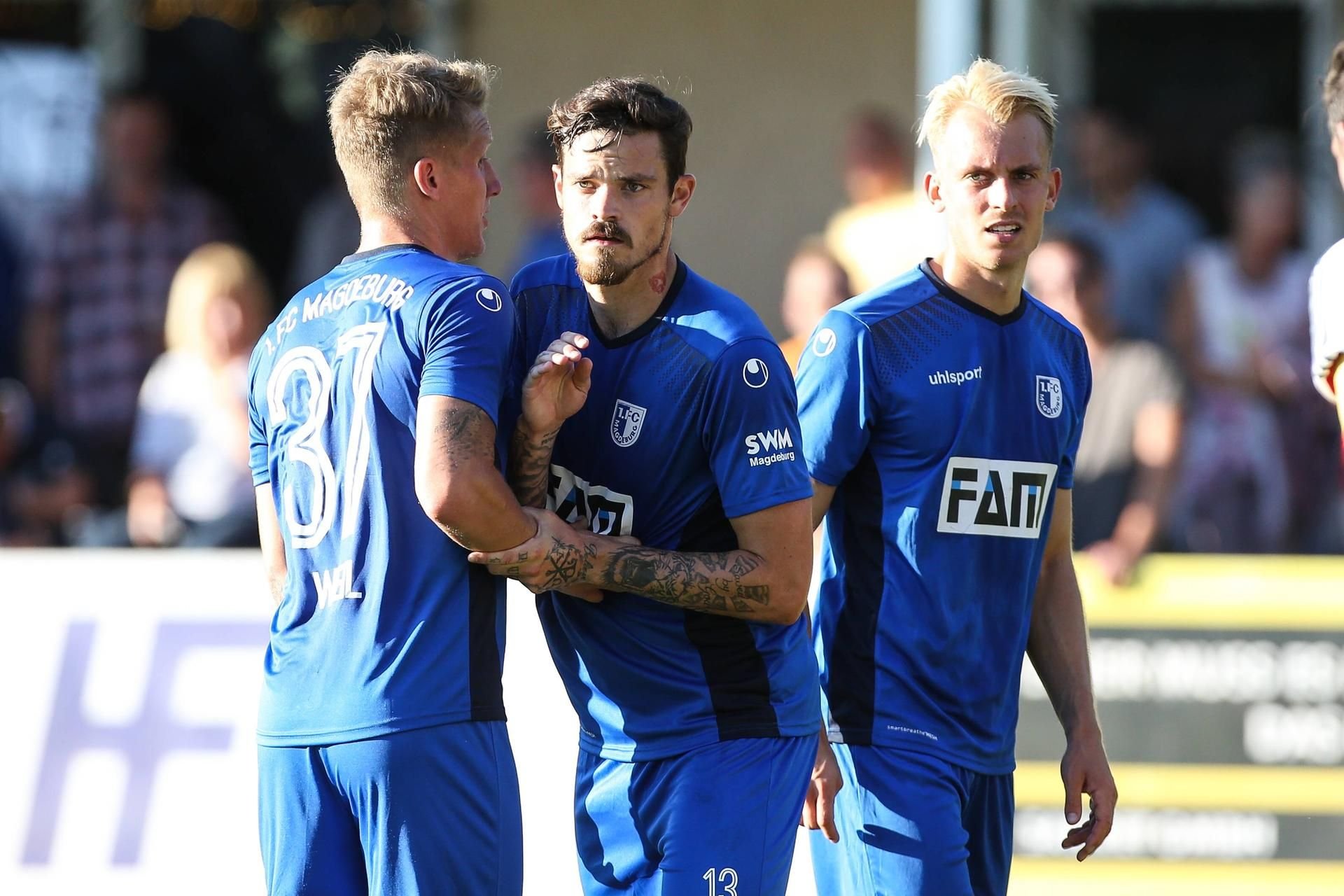 Dennis Erdmann (Mitte) beim 1. FC Magdeburg.