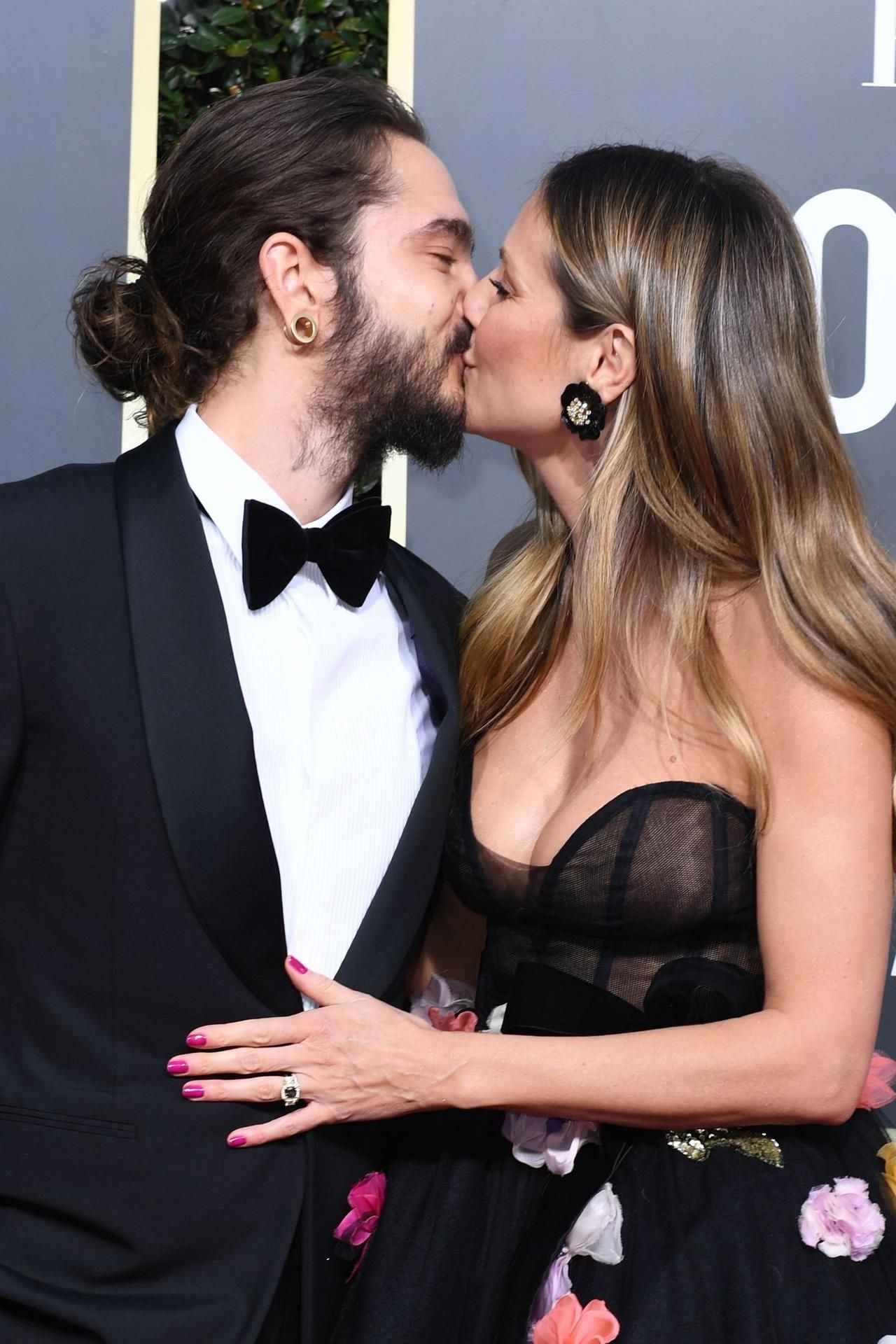 Dicker Kuss für die Kameras: Heidi Klum und ihr Verlobter Tom Kaulitz (l.).