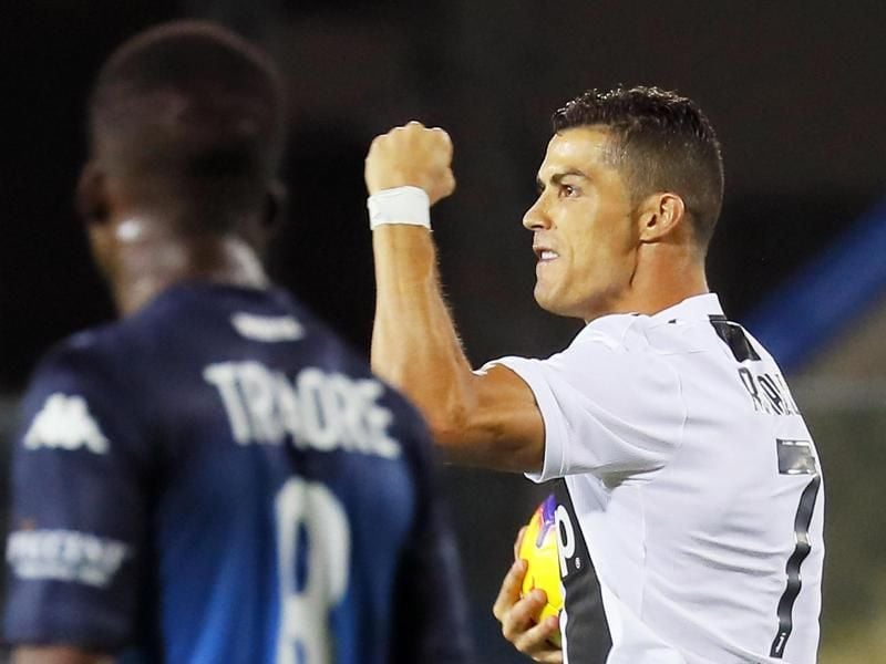 Cristiano Ronaldo (r) hatte gegen Empoli gleich doppelten Grund zum Jubel. Foto: Fabio Muzzi/ANSA