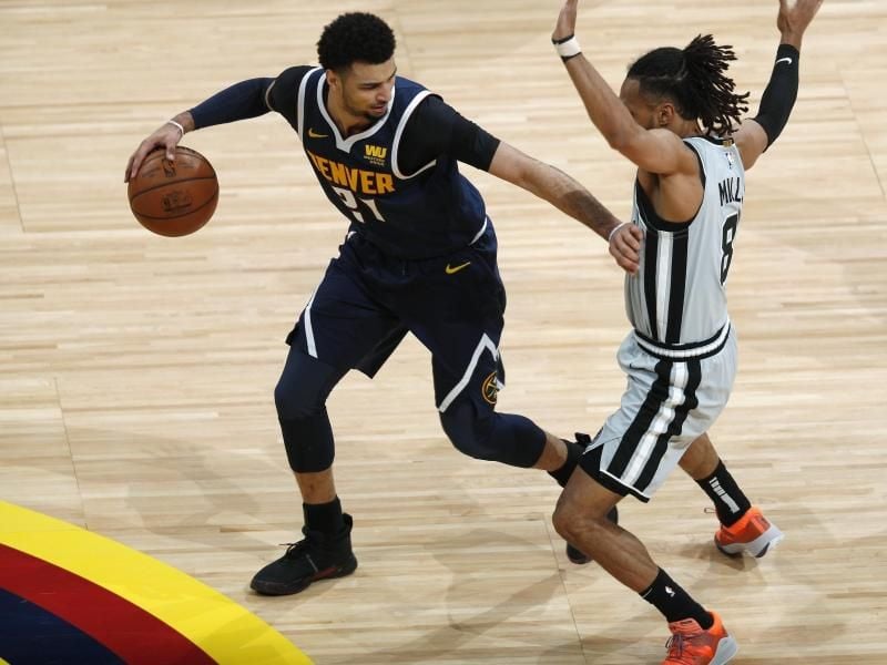 Jamal Murray (l) war für Denver am Ende der Matchwinner. Foto: David Zalubowski/AP