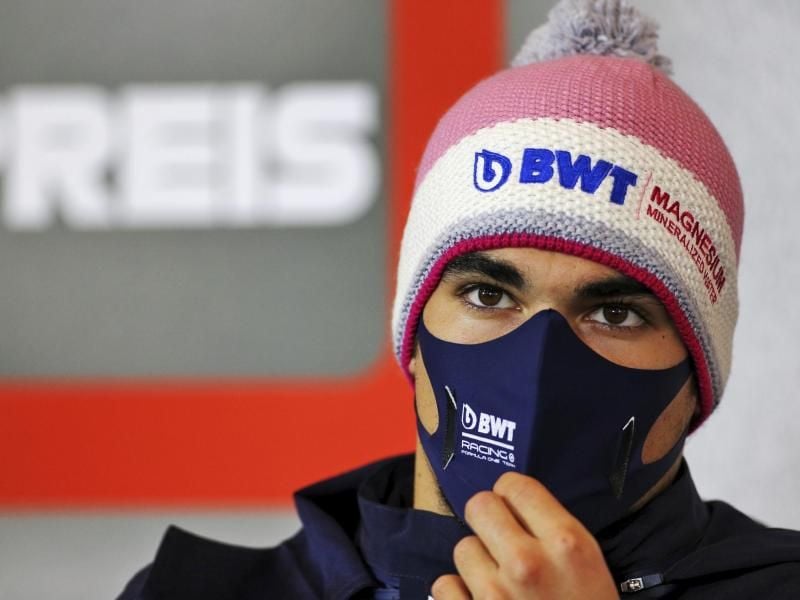 Lance Stroll aus Kanada vom Team Racing-Point nimmt mit Mund-Nasen-Schutz an einer Pressekonferenz teil. Foto: Xpbimages.Com/POOL xpbimages.com/AP/dpa/Archivbild