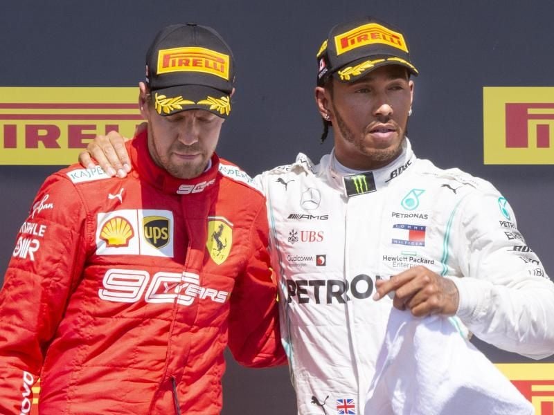 Zurückhaltende Freude bei Sieger Lewis Hamilton (r) und dem Zweitplatzierten Sebastian Vettel. Foto: Paul Chiasson/The Canadian Press/AP