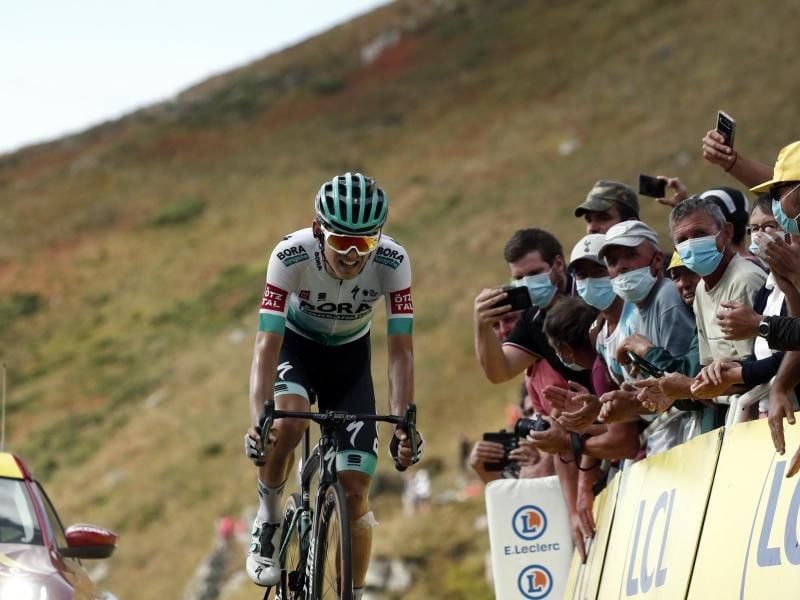 Zeigt starke Leistungen bei seiner zweiten Tour: Lennard Kämna (l). Foto: Benoit Tessier/Reuters/AP/dpa