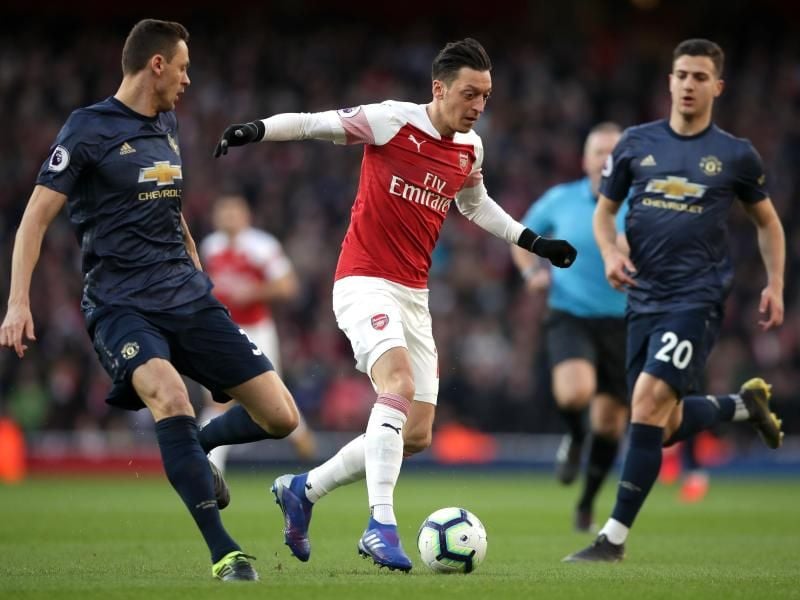 Der Brexit könnte für den für den FC Arsenal spielenden Mesut Özil Probleme mit sich bringen. Foto: John Walton/PA Wire/dpa