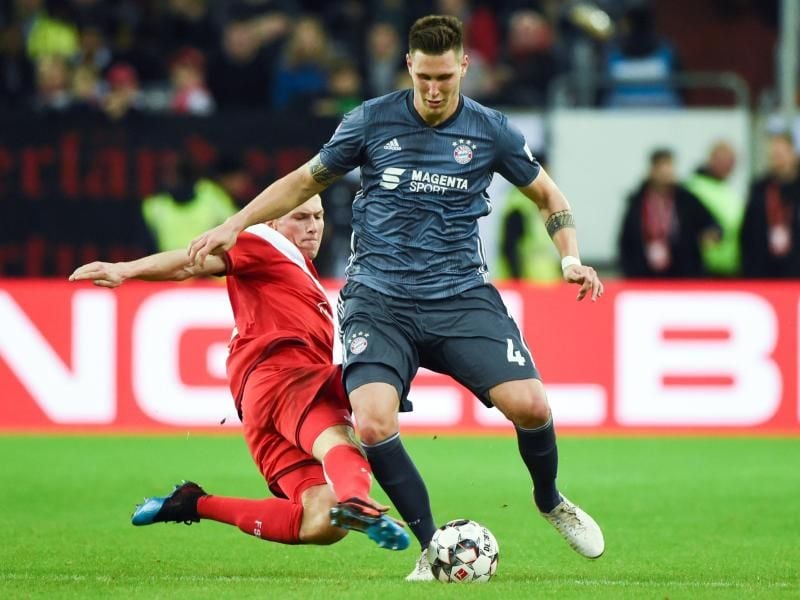 Bayern München um Niklas Süle setzte sich im Elfmeterschießen durch. Foto: Christophe Gateau