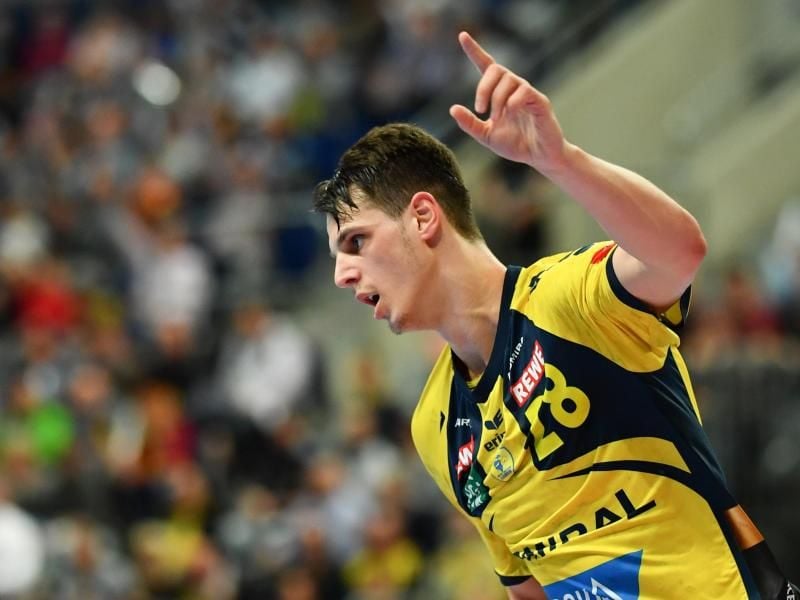 Filip Taleski von den Rhein-Neckar Löwen jubelt über ein Tor. Foto: Uwe Anspach