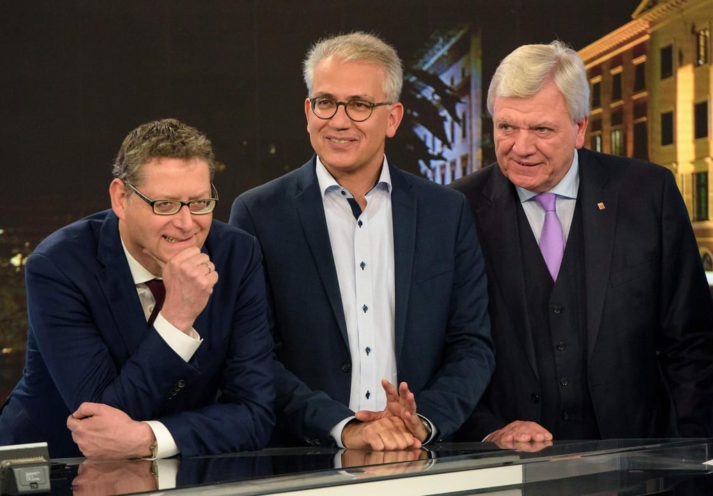 Thorsten Schäfer-Gümbel (SPD, l.), Tarek Al-Wazir (Grüne, M.) und Volker Bouffier (CDU, r.)