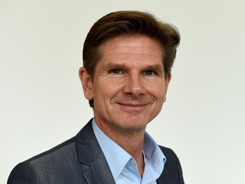 Der schleswig-holsteinische Sozialminister Heiner Garg (FDP) steht im Landeshaus. Foto: Carsten Rehder/Archiv