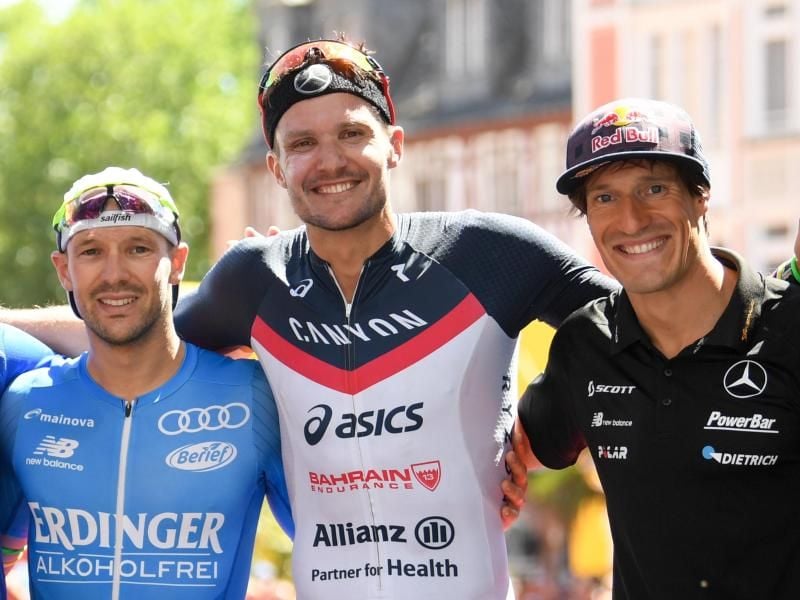 Patrick Lange, Jan Frodeno und Sebastian Kienle (l-r) sind bereit für den Showdown bei der Ironman-EM in Frankfurt. Foto: Arne Dedert