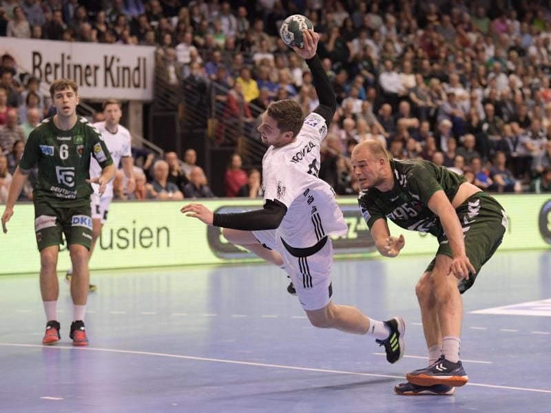 Könnten im Finale des EHF-Cups aufeinandertreffen: Der THW Kiel und die Füchse Berlin. Foto: Jörg Carstensen