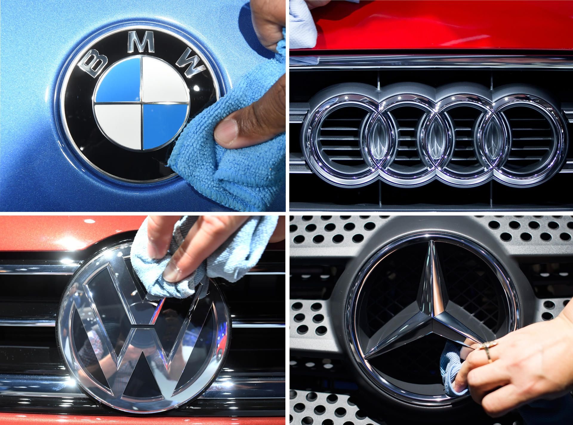 Die Logos der deutschen Autobauer BMW, Audi, Volkswagen und Daimler