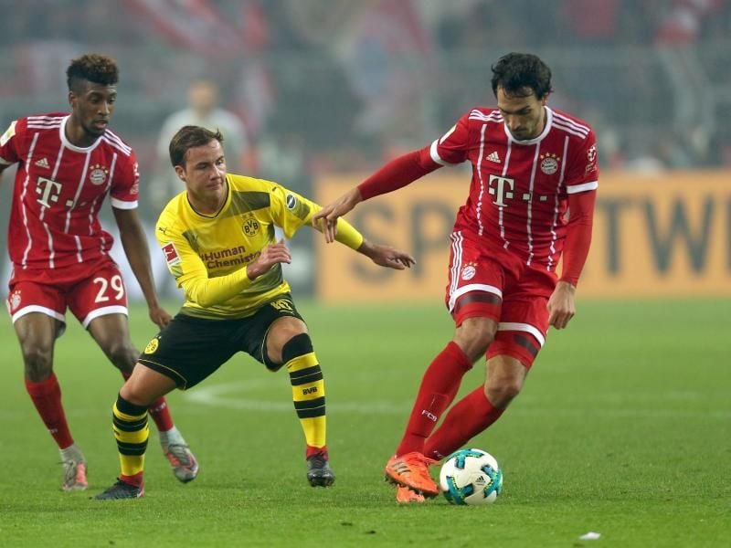Spielten beide schon für Bayern und den BVB: Mats Hummels (r) und Mario Götze (M). Foto: Ina Fassbender