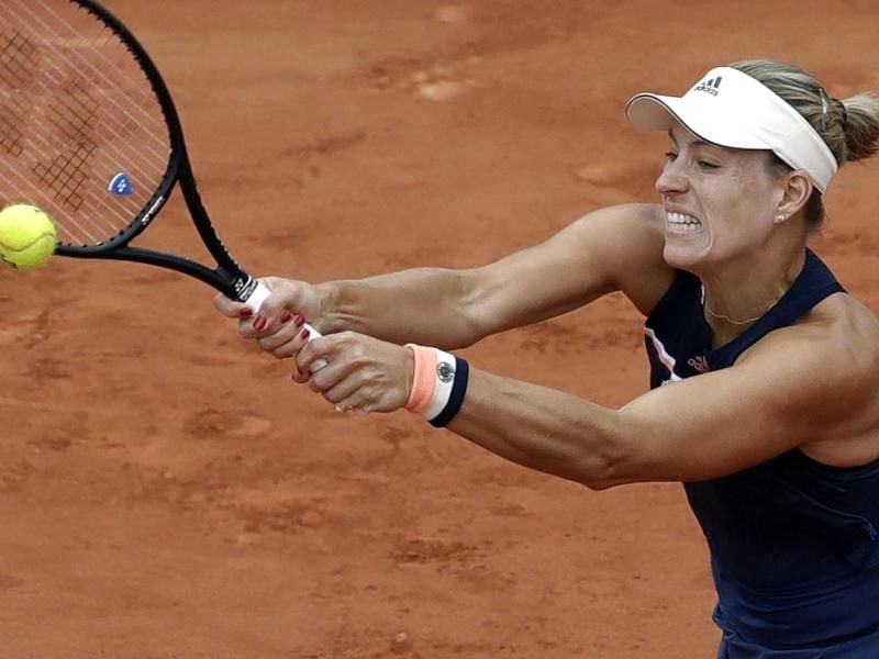 Angelique Kerber muss ihr Match am Mittwoch weiterspielen. Foto: Alessandra Tarantino/AP
