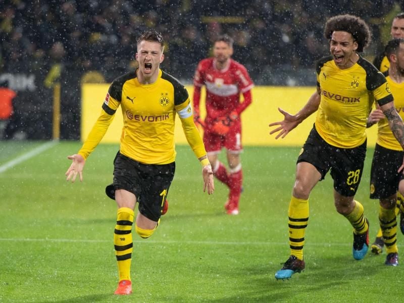 Marco Reus (l) will mit dem BVB die Meisterschaft gewinnen. Foto: Bernd Thissen