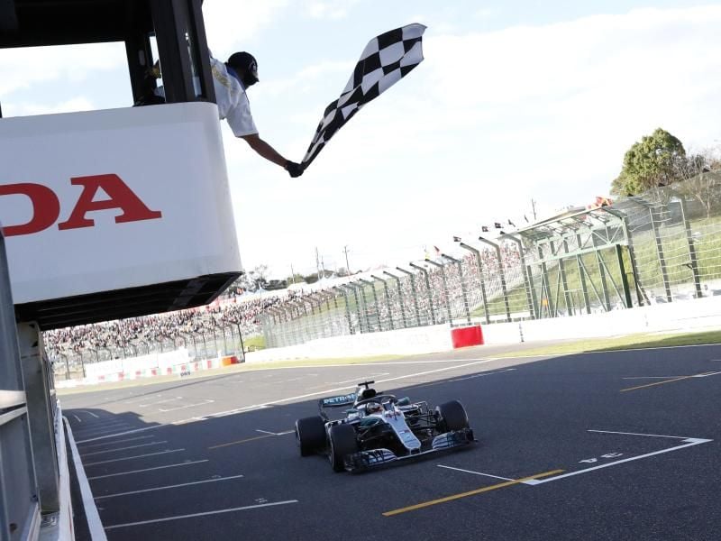 Lewis Hamilton raste auch in Suzuka als Erster über die Ziellinie. Foto: Issei Kato/POOL Reuters/AP