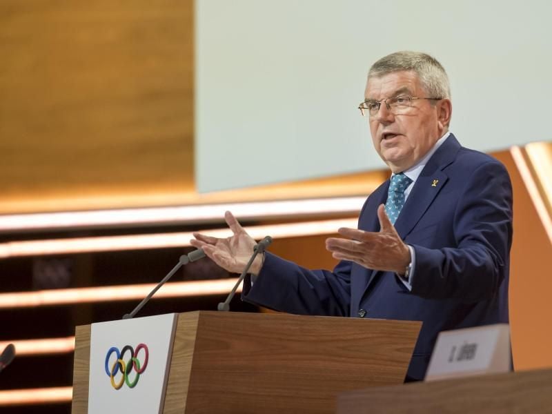 IOC-Chef Thomas Bach ist zufrieden mit dem neuen Werbevertrag. Foto: Jean-Christophe Bott/KEYSTONE