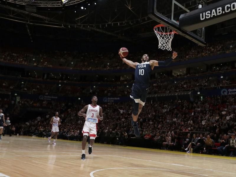 US-Basketballer Jayson Tatum zeigt einen einhändigen Dunk. Foto: Rick Rycroft/AP