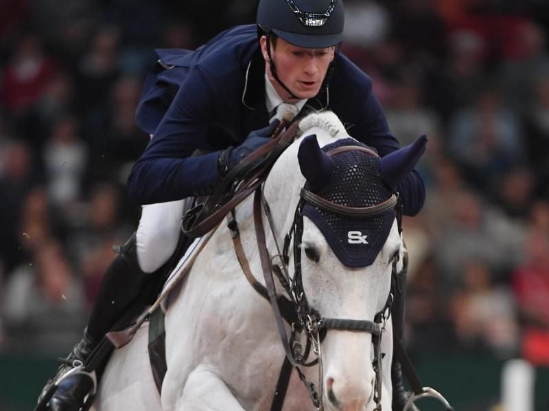 Daniel Deußer reitet auf Cornet D'Amour durch den Parcours. Foto: Hendrik Schmidt