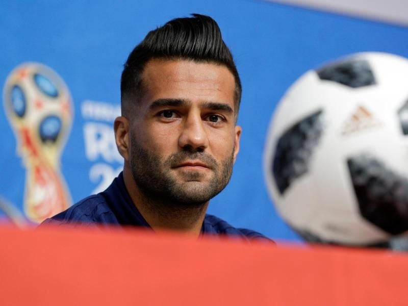 Irans Kapitän und Mittelfeldspieler Masoud Shojaei bei einer Pressekonferenz. Foto: Andrew Medichini/AP