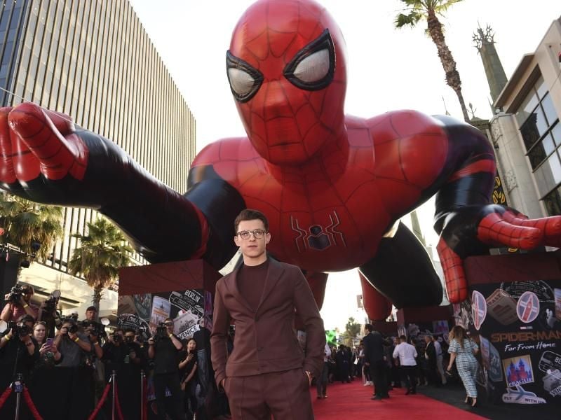 Da war die Welt noch in Ordnung: Tom Holland bei der Weltpremiere von „Spider-Man: Far From Home” in Los Angeles (2019). Foto: Chris Pizzello/Invision/dpa