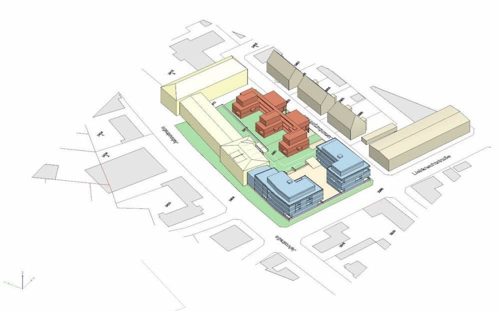 Das Modell des Wohnquartiers: Blau und braun unterlegt sind die Neubauten, die Stadthäuser entstehen in dem weißen Riegel an der Jahnstraße.