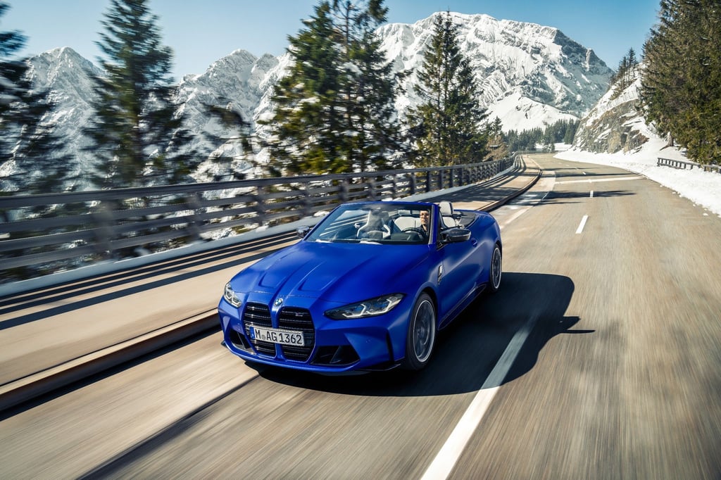 Beim M4 Cabrio (ab 98 500 Euro) gesellen sich zur großen Niere unter anderem markante Nüstern auf der Motorhaube, größere Lufteinlässe und weiter ausgestellte Kotflügel.