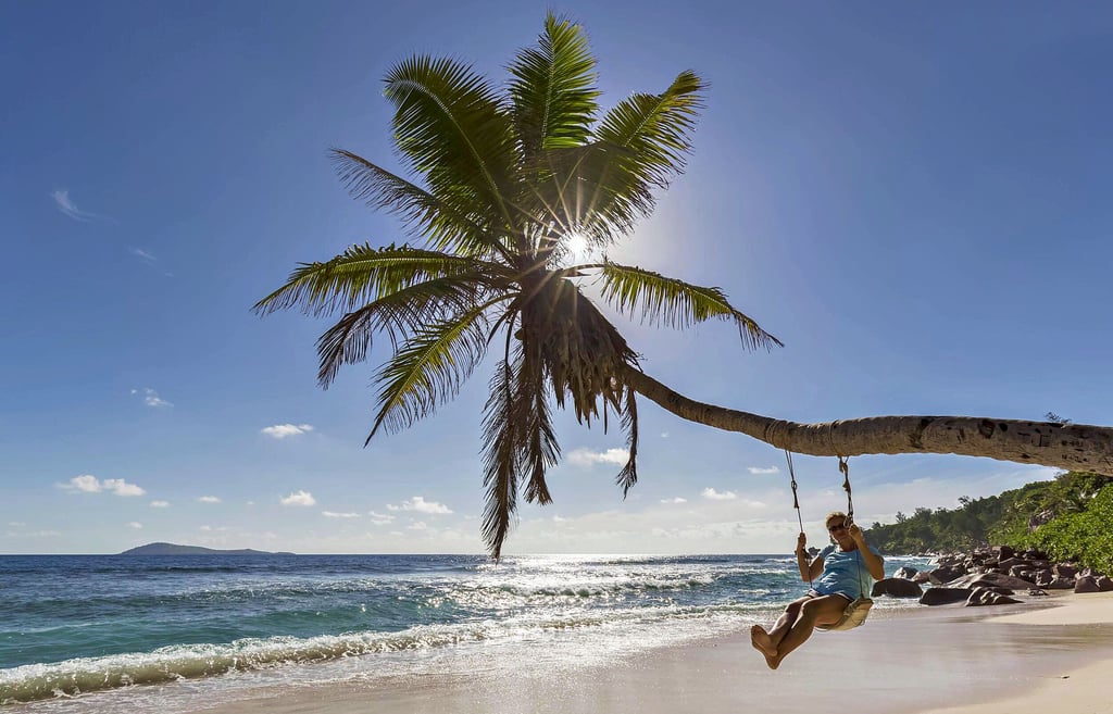 Unbeschwerter Urlaub unter Palmen, wie hier auf den Seychellen, bleibt für viele Menschen vorerst ein Traum.