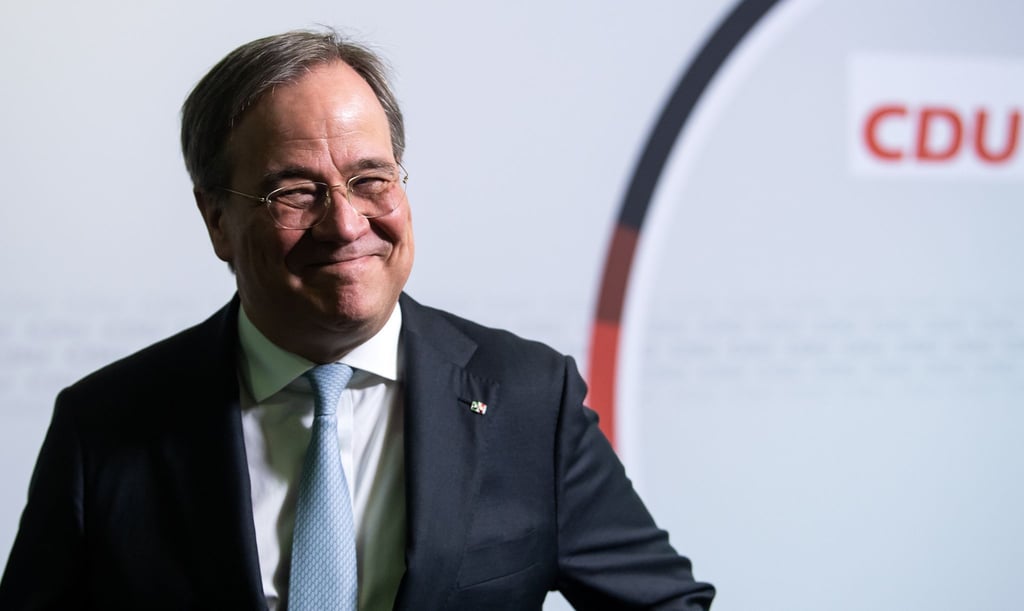 Armin Laschet (CDU) lächelt bei einem Pressetermin.