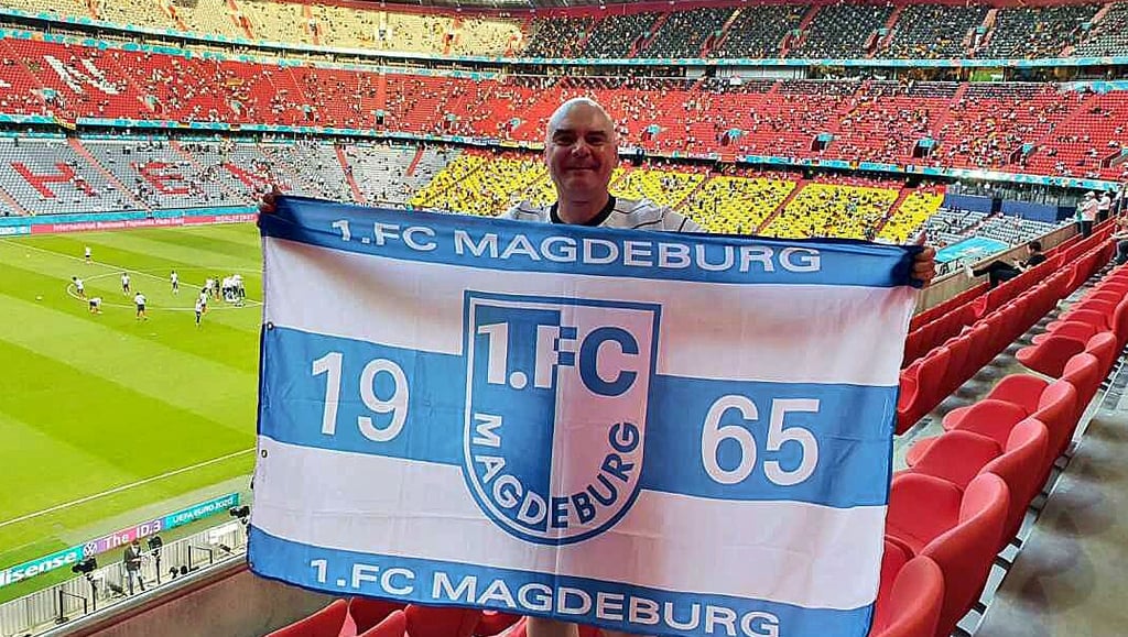 Zum Auftakt der Gruppenphase für die DFB-Elf zeigte Andreas Müller seine Fanleidenschaft zum 1. FC Magdeburg. Trotz der Niederlage ist Müller optimistisch fürs Weiterkommen.