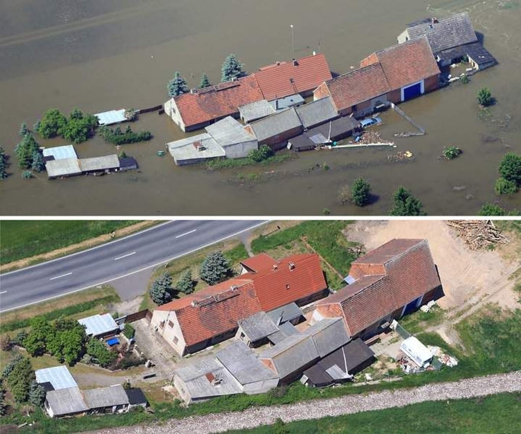 ARCHIV - BILDKOMBO - Vom Hochwasser überflutete Grundstücke in Fischbeck (Sachsen-Anhalt), aufgenommen am 11.06.2013 (oben) und am 16.05.2014 (unten). Das Dorf wurde durch das Hochwasser der Elbe im Sommer 2013 stark beschädigt. Foto: Jens Wolf/dpa (zu dpa-Themenpaket Hochwasser vom 27.05.2014) +++(c) dpa - Bildfunk+++