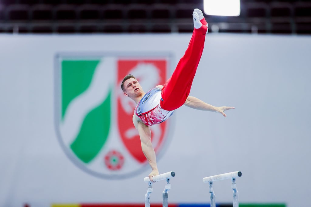 Lukas Dauser holte sich den Titel am Barren.