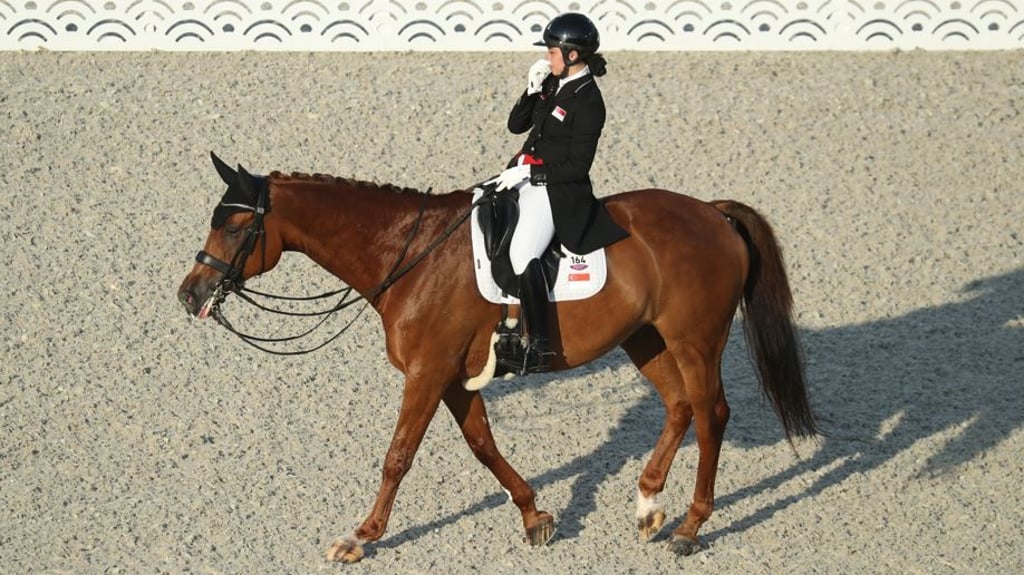 Die Reiterin aus Singapur wird bei den Olympischen Spielen in Tokio nicht mehr an den Dressurwettbewerben teilnehmen können, weil ihr Wallach Tribiani aus dem Mund blutete.