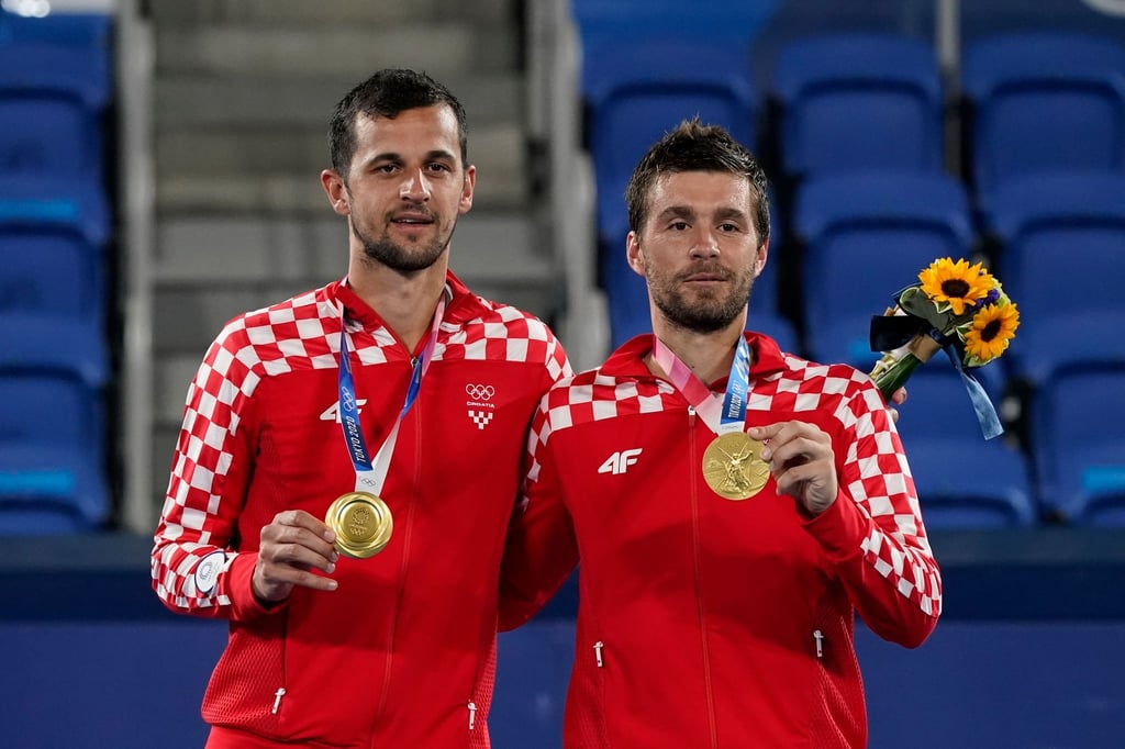 Die neuen Olympiasieger im Doppel: Mate Pavic (l) und Nikola Mektic.