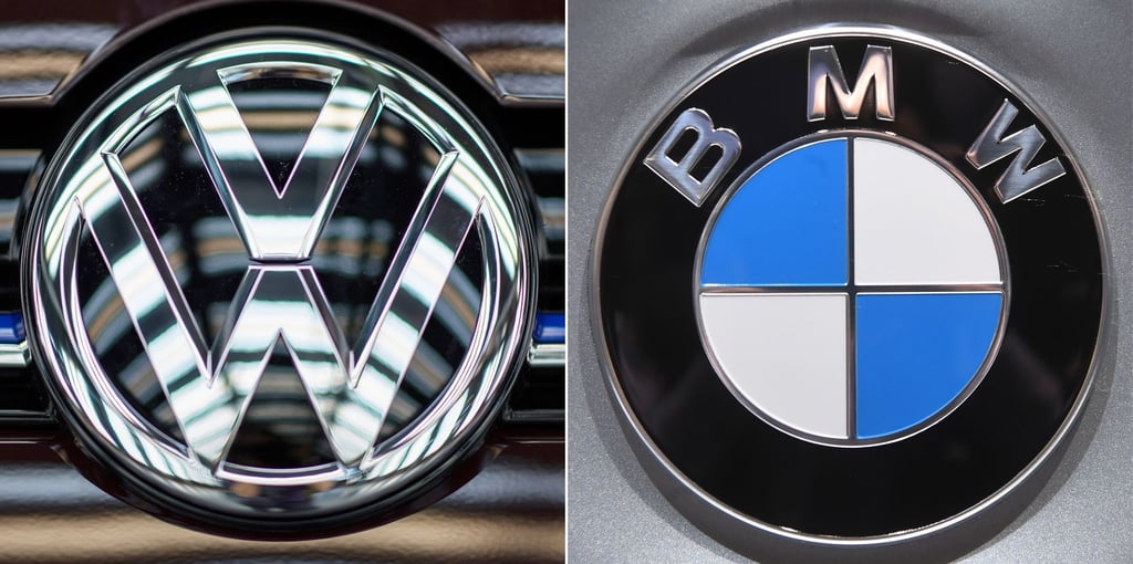 Die Logos der Automobilhersteller VW und BMW. Die EU-Kommission hat gegen die beiden deutschen Autobauer Wettbewerbsstrafen in dreistelliger Millionenhöhe verhängt.