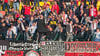 Im Anzug auf dem Zaun und mit Zylinder im Stadion: Der HFC-Fanblock in Berlin setzt auch modisch Akzente.