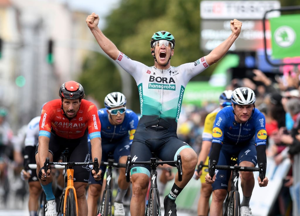 Ackermann vom Team Bora-hansgrohe jubelt nach seinem Sieg auf der ersten Etappe der Deutschland-Tour.