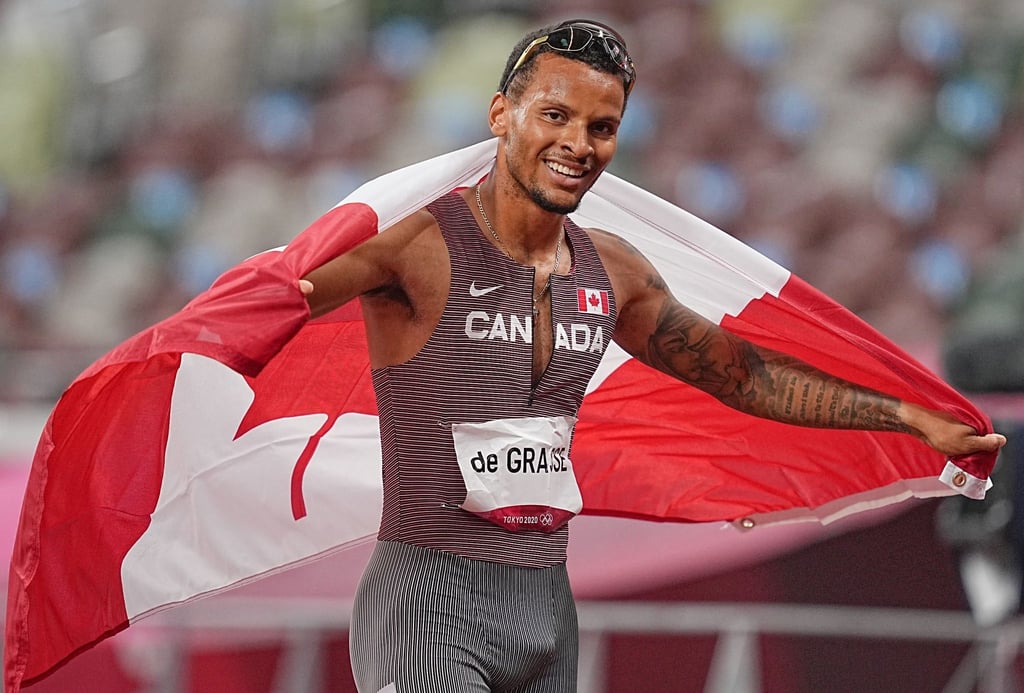 Der Kanadier Andre de Grasse jubelt im Ziel nach seinem Sieg über 200 Meter.