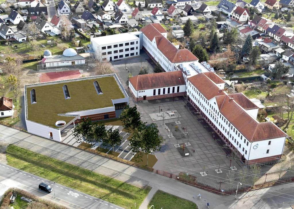 So soll die Turnhalle (links) auf dem Schulhof des Gropius-Gymnasiums einmal aussehen.
