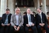 Uwe Schulze (CDU, l-r), Landrat von Anhalt-Bitterfeld, Bernd Hauschild (SPD), Oberbürgermeister von Köthen, Reiner Haseloff (CDU), Ministerpräsident von Sachsen-Anhalt, und Kreisoberpfarrer Lothar Scholz sitzen bei einem Gottesdienst für einen verstorbenen 22-Jährigen.