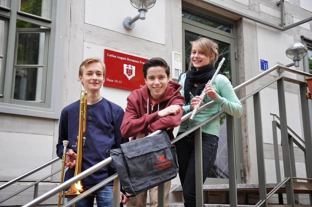 Robert Bily (M.) mit Theodor Schenck und Paulina Lakomy.