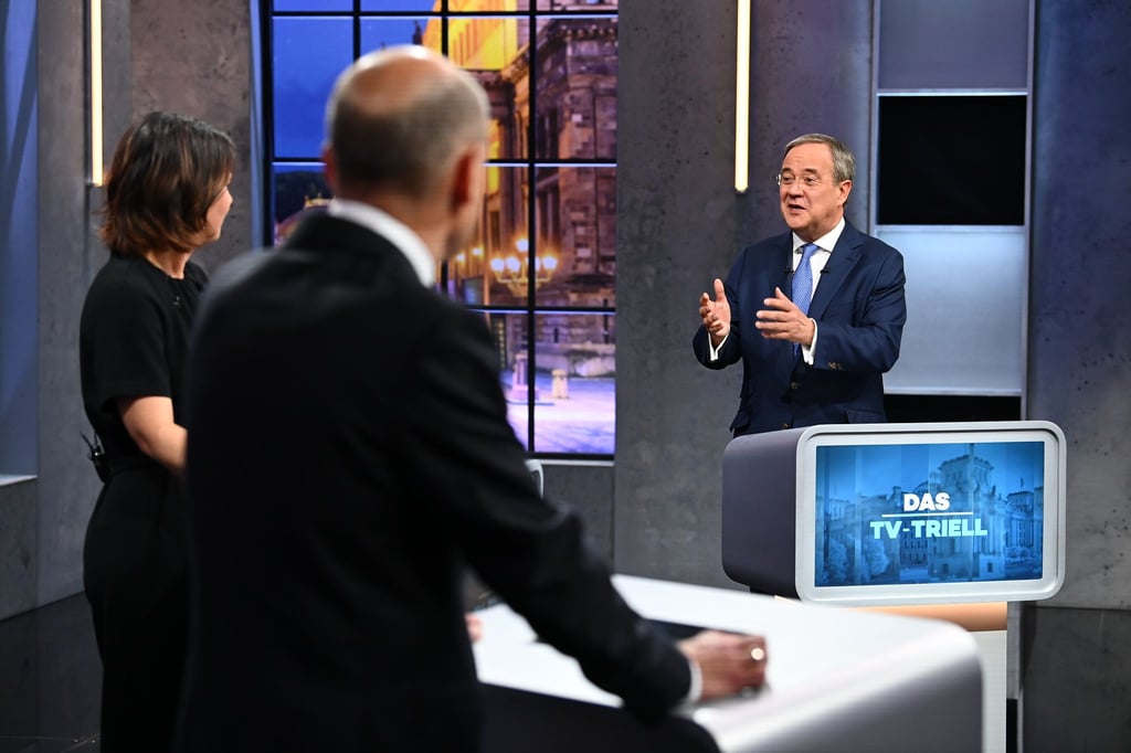 Olaf Scholz, Annalena Baerbock Armin Laschet (r) im letzten TV-Triell vor der Bundestagswahl.