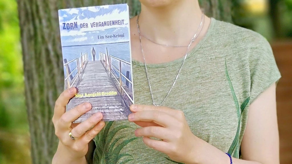 Sina Kongehl-Breddin hat auch beim neuen Krimi die Titelseite gestaltet und sich selbst auf ihrer Zeichnung verewigt.